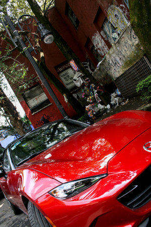 Mexico city, Mexico ; 10 30 2018: Expensive car and homeless in the background. Showing the social...