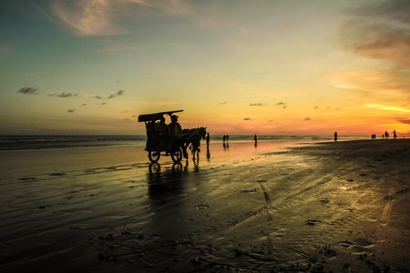 silhouette and Sunset at Parangtritis Beachの写真素材
