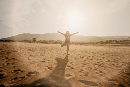 a Girl with yoga pose at Parangkusumo Desertのeditorial素材