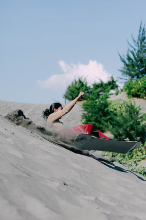 sandboarding at Parangkusumo Desert jogjakarta indonesiaのeditorial素材