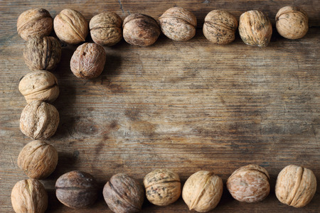 Walnuts on wooden backgroundの写真素材
