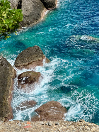 rocks in the sea, photo as a background, digital image. Portofino, Italy.の写真素材