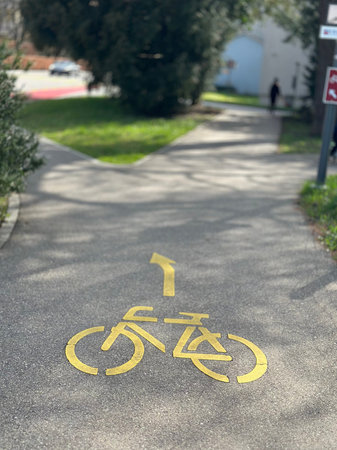 Bicycle sign on a bike path in the city. Bike lane.
