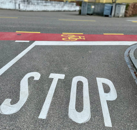 STOP sign for transport at the intersection. Speed limit sign on the road