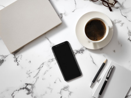Top view of modern workspace with smartphone, supplies and coffee cuple backgroundの素材