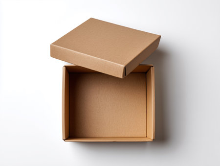 Open cardboard box isolated on white background. Top view.の素材