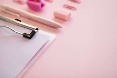 A set of tools for eyelash extensions on a pink background.の写真素材