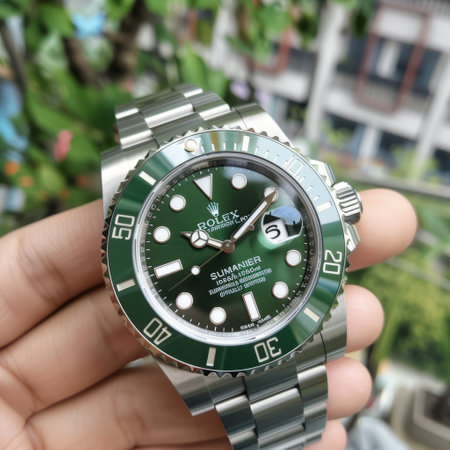 Closeup of man hand holding luxury wrist watch.の素材