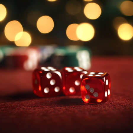 Red dices on red background with bokeh effect. Casino conceptの素材