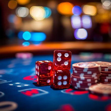 Casino roulette table with red dices and poker chips.の素材