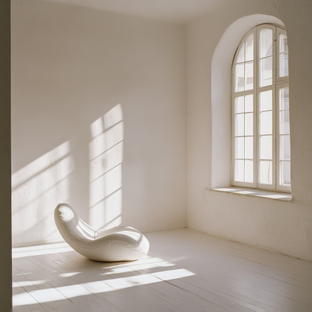 interior of a white room with a window and a chair in the sunの素材