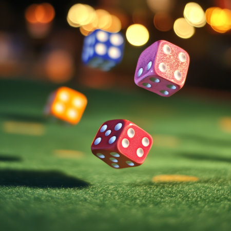 Dice falling on green casino table with bokeh background.の素材