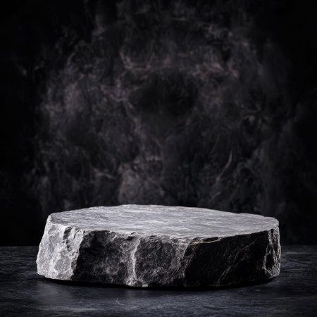 Black marble pedestal on black background. 3d rendering, mock upの素材