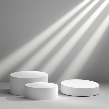 3d render of white podiums with rays of light on gray backgroundの素材