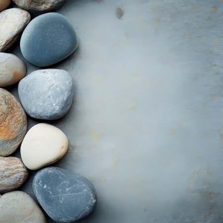 Pebbles on stone background with copy space for text or imageの素材
