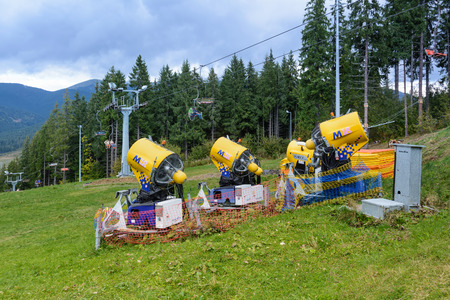 Snow gun. Snow making machine. Machine that makes artificial snow and blows it onto ski slopes.の写真素材