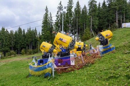 Snow gun. Snow making machine. Machine that makes artificial snow and blows it onto 

ski slopes.の写真素材