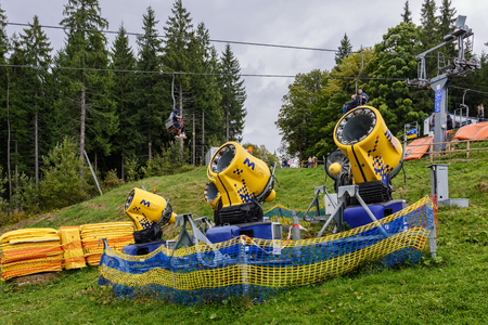 Snow gun. Snow making machine. Machine that makes artificial snow and blows it onto 

ski slopes.の写真素材