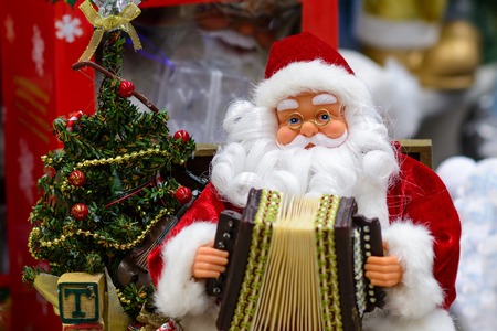 Santa Claus with an accordion. Father Frost, Father Christmas.の写真素材