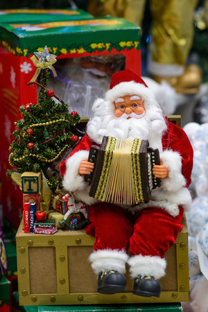 Santa Claus with an accordion. Father Frost, Father Christmas.の写真素材