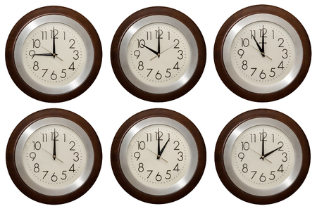 Wall clock isolated on the white background. Multiple clocks showing different time. Part 1.の写真素材