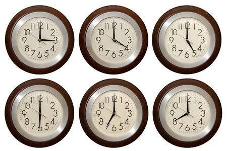 Wall clock isolated on the white background. Multiple clocks showing different time. Part 2.の写真素材