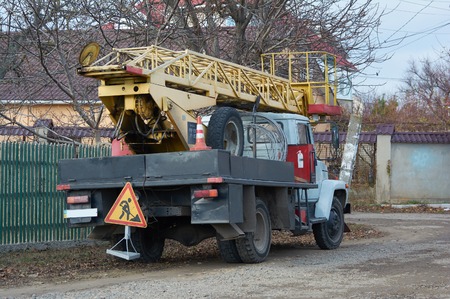 Repair truck with turntable ladder and tower. Work truck. Boom lift.の写真素材