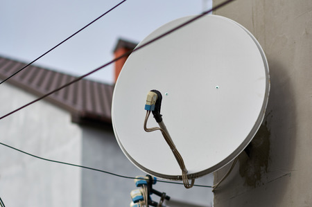 Bowl-shaped antenna with which signals are transmitted to or received from a communications satellite.の写真素材