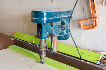 Tools in the carpentry workshop: electric milling cutter, drill.の写真素材