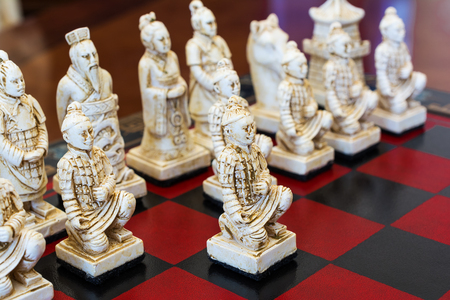 Board game of strategic skill for two players, played on a checkered board.の写真素材