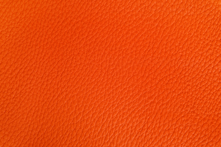 Background image of the texture of the leather, painted in orange.の写真素材