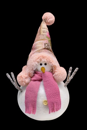 Christmas and New Year decorations: Figure of snowman in the style of handmade. Isolated on a black background.の写真素材