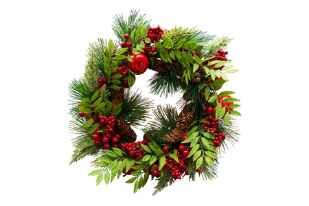 Christmas wreath of cones, spruce branches and berries, New Year's decorations. Isolated, white background.の写真素材