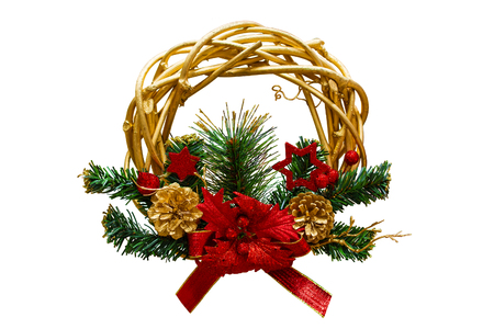 Christmas wreath of cones, spruce branches and flowers, New Year's decorations. Isolated, white background.の写真素材