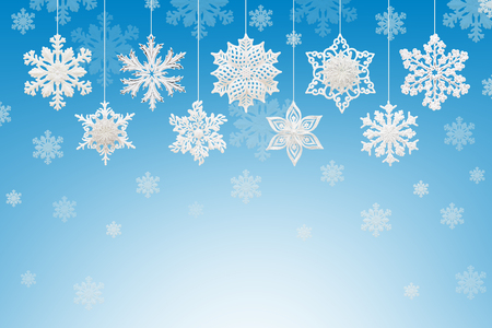 Christmas and New Year decorations: figurines of snowflakes on blue background.の写真素材