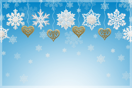 Christmas and New Year decorations: snowflakes and golden hearts on blue background.の写真素材