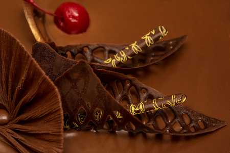 Delicious chocolate cake with glaze, decoration of confectionery with chocolate.の写真素材