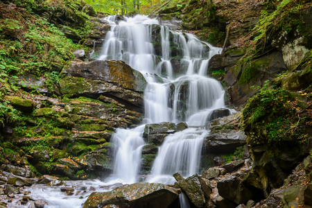 Waterfall Shypit, cascade in Pylypets in the autumn forest. Carpathian Mountains, Zakarpatska oblast, Ukraine.の写真素材