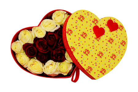 Gift box in the form of heart with scarlet bow, white and red live roses. Valentines Day concept. Isolated, white background.の写真素材