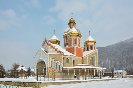 Church of Nativity of St. John the Baptist, Yaremche, Ukraine. Winter city landscape.の写真素材