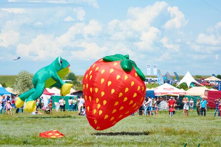 Ukraine, Mykolaiv region, Trykhaty - May, 18, 2019: Kitefest, Tryhutty International Kite Festival 2019 in the village Trykhaty, Ukraine. Annual kitefest.のeditorial素材