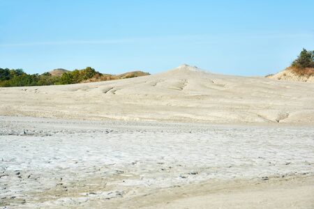 Muddy volcanoes Paclele Mari near Buzau, Romania. Mud and natural-gas eruptions create small volcanoes in natural reserve.の写真素材