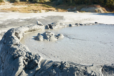 Muddy volcanoes Paclele Mari near Buzau, Romania. Mud and natural-gas eruptions create small...