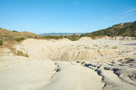 Muddy volcanoes Paclele Mari near Buzau, Romania. Mud and natural-gas eruptions create small...