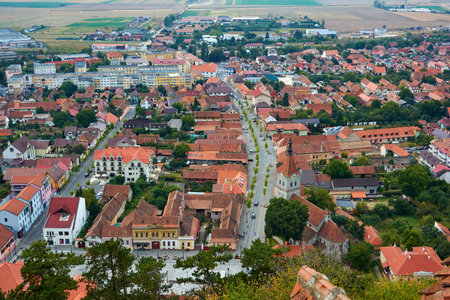 Panorama of the historic city center from the balcony of the medieval fortress Rasnov, Romania. City landscape of the ancient town.の写真素材