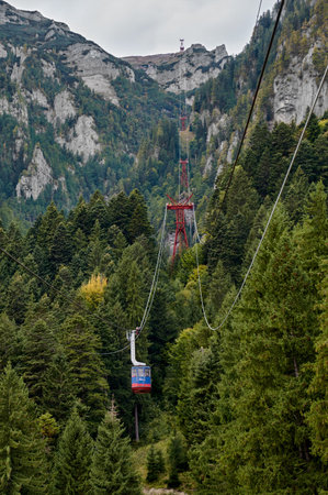 Mountain cable car, telecabin in the Bucegi Mountains. Mountain landscape in Bucegi Natural Park...