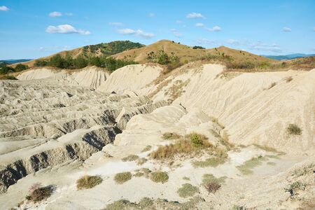 Muddy volcanoes Paclele Mari near Buzau, Romania. Mud and natural-gas eruptions create small volcanoes in natural reserve.の写真素材