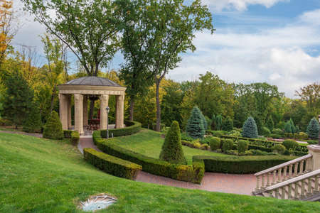 Mezhyhirya National Park, Novi Petrivtsi, Kyiv region, Ukraine - October, 16, 2020: Museum of Corruption. The large natural complex Mezhyhirya Residence with a beautiful garden, a cascade of lakes.のeditorial素材