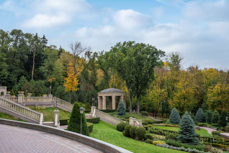 Mezhyhirya National Park, Novi Petrivtsi, Kyiv region, Ukraine - October, 16, 2020: Museum of Corruption. The large natural complex Mezhyhirya Residence with a beautiful garden, a cascade of lakes.のeditorial素材