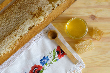 Sweet organic product honey and honeycombs slice. Honey delicacy and healthy dessert.の写真素材